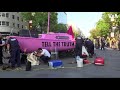 climate activists block traffic with sailboat in middle of washington dc intersection