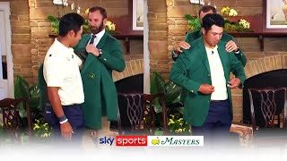 Hideki Matsuyama reacts to winning Masters and is presented with green jacket by Dustin Johnson