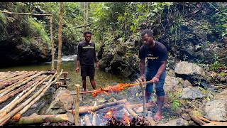 IN PAPUA FOREST CAMPING & BUILDING SHELTERS, COOKING FISH AND GRILLING CHICKEN, LOOKING FOR WATER...