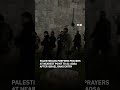 Palestinian worshippers pray outside Al-Aqsa after Israeli forces block access