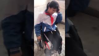 Little girl with high paraplegia in wheelchair 每天都得準時來學校幫琪琪上洗手間209