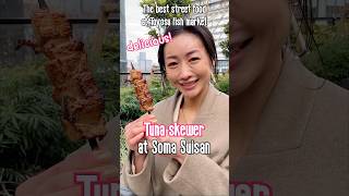 A Japanese lady shares the Best street food at Senkyaku Banrai in Tosyosu Fish Market,