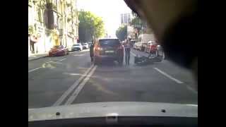 Motorcyclist Crashes Into Open Door! (Biker Shouldn't Have Passed On The Right)