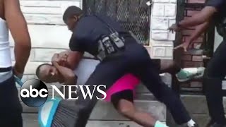 Police officer suspended after beating a man in Baltimore