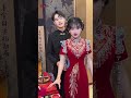 behind the scenes beautiful bride in red qipao