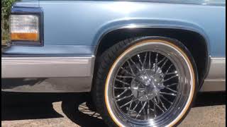 Cadillac on spokes and vogues