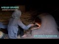 Morocco baking bread in a clay oven - A Desert Village in the Sahara