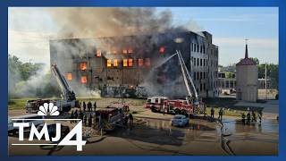 22-year-old woman arrested after a fire destroyed vacant building on Milwaukee's north side