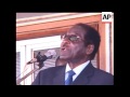 Zimbabwe's President Robert Mugabe flew back home on Friday after an African Union summit in Egypt s