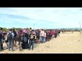 Unending flow of migrants cross the Greece-Macedonia border