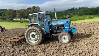 Ford 7000 cultivating.