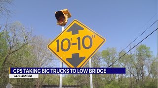 GPS taking big trucks to low bridge