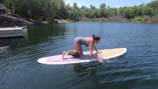 Celebrating 8 months from my amputation with a headstand on my paddleboard