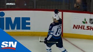 Trouba and Lowry score 21 seconds apart for Jets