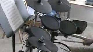 Messings around on the drums (blast beats)