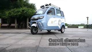 Electric tricycle with fully enclosed body, useful in bad weather.