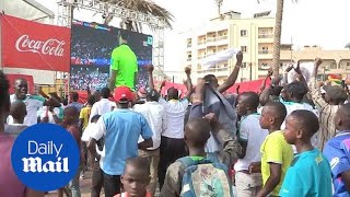 Senegal fans react after 2-1 win over Poland in the World Cup