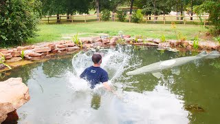 Jumping into the Alligator Gar Pond!