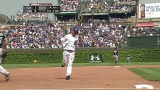 PItcher Travis Wood clears the bases with a GRAND SLAM!