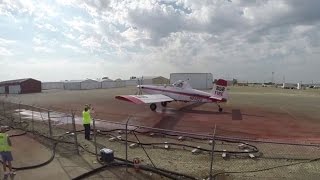 Loading a single-engine air tanker with wildfire retardant