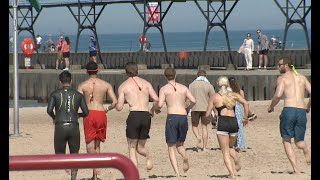 'I have to for my daughter': Grieving mom watches lifeguards return to South Haven