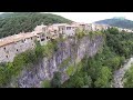 castellfollit de la roca a narrow city above a cliff