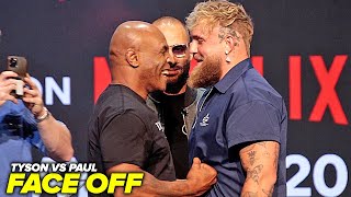 Mike Tyson PUNCHES Jake Paul in stomach in First Face OFF at press conference!