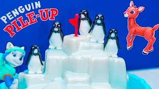 Playing Penguin Pile Up Game with Paw Patrol Everest against Rudolph Toys
