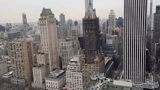 Oversee midtown NY and central park from the rooftop of Park Lane hotel