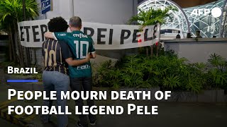 Brazilians mourn death of football legend Pele | AFP