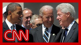 Rare joint appearance of Biden and two predecessors underscores extraordinary mo