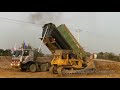 ឡានបែនចាក់ដីធ្វើផ្លូវ big dump truck unloading soil making big road in cambodia