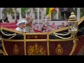 royal procession queen travels by horse and carriage through the streets of london