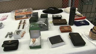 Customs officers show off seized drugs, counterfeit products
