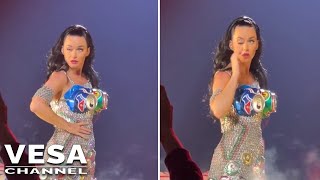 Katy Perry struggles to open her right eye during a concert