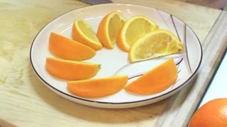 How to Cut an Orange Lengthwise : Fruit Cutting Tips