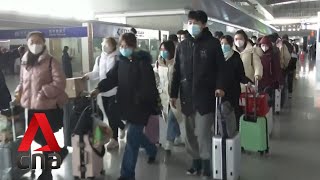 COVID-19: Chinese cities on high alert as holiday travel season begins