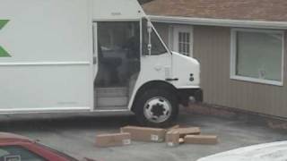 FedEx Guy Launches Boxes Off Truck