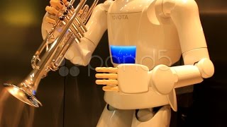 Toyota Partner Robot Plays The Trumpet. Stock Footage