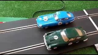 Scalextric Tri-Ang Aston Martin db5 vs Jaguar E type