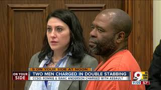Two men charged in double stabbing