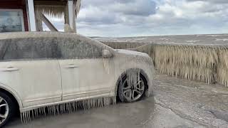 Ice Encases Cars Beside Lake Erie