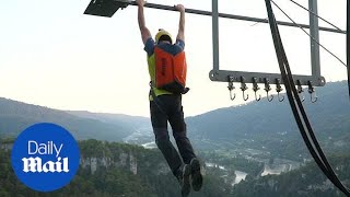 Daredevils take part in the annual base jumping festival in Sochi