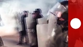 Amateur video: Sarajevo protesters pelt cops with missiles as violent clashes erupt across Bosnia