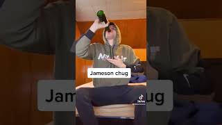 Leach chugs a bottle of Jameson