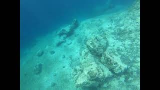 Greece - August / September 2024 - snorkeling around an island looking to an abyss