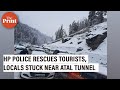 Himachal Pradesh police rescues tourists, locals stuck in snowfall near Atal Tunnel