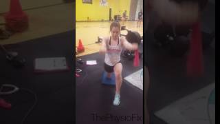 Half-kneeling multifidi punch with overhead reach for gymnast