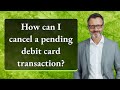 How can I cancel a pending debit card transaction?