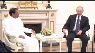 Russian President Vladimir Putin warmly greets President Maithripala Sirisena